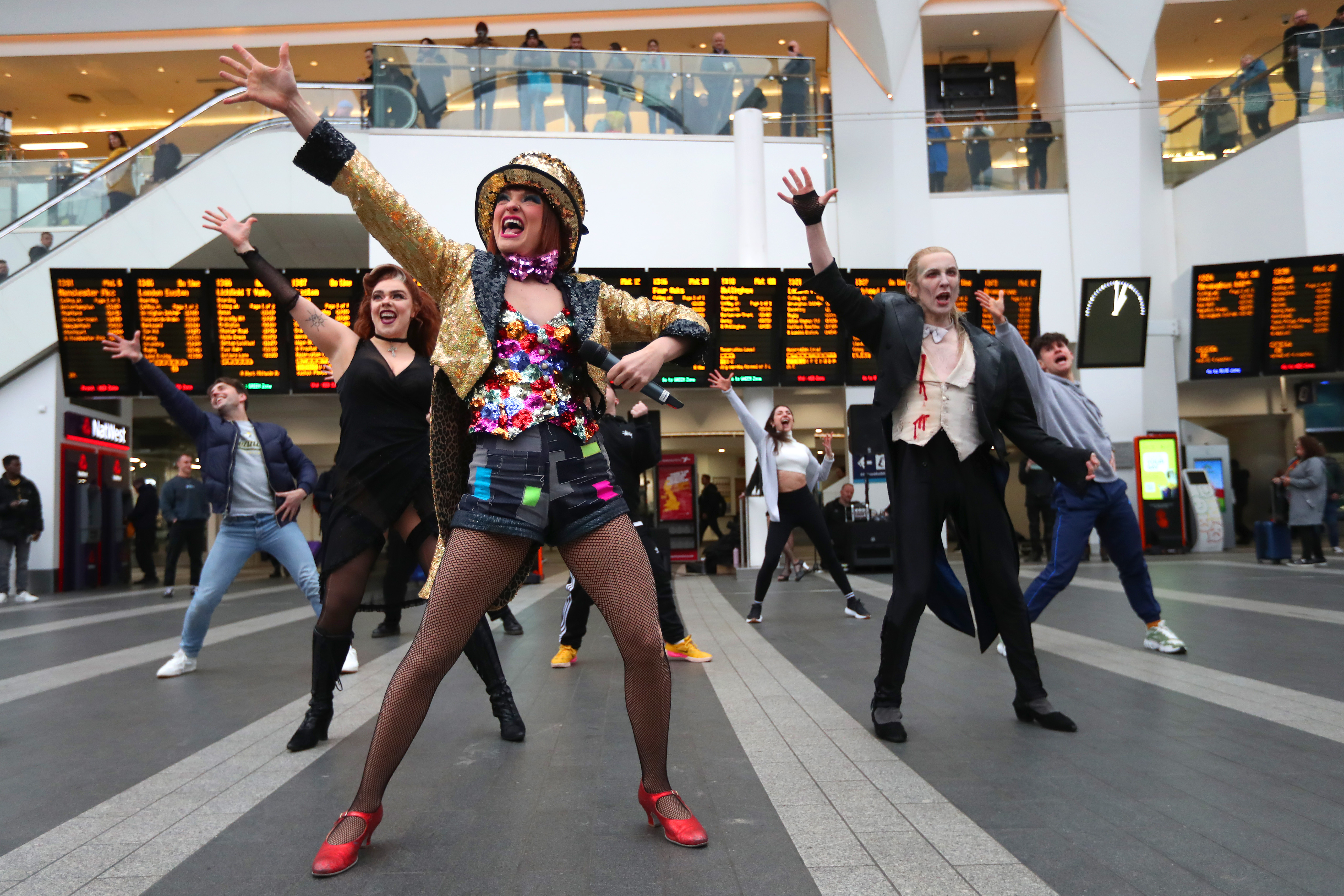 The Rocky Horror Show perform a surprise flash mob at Birmingham New Street